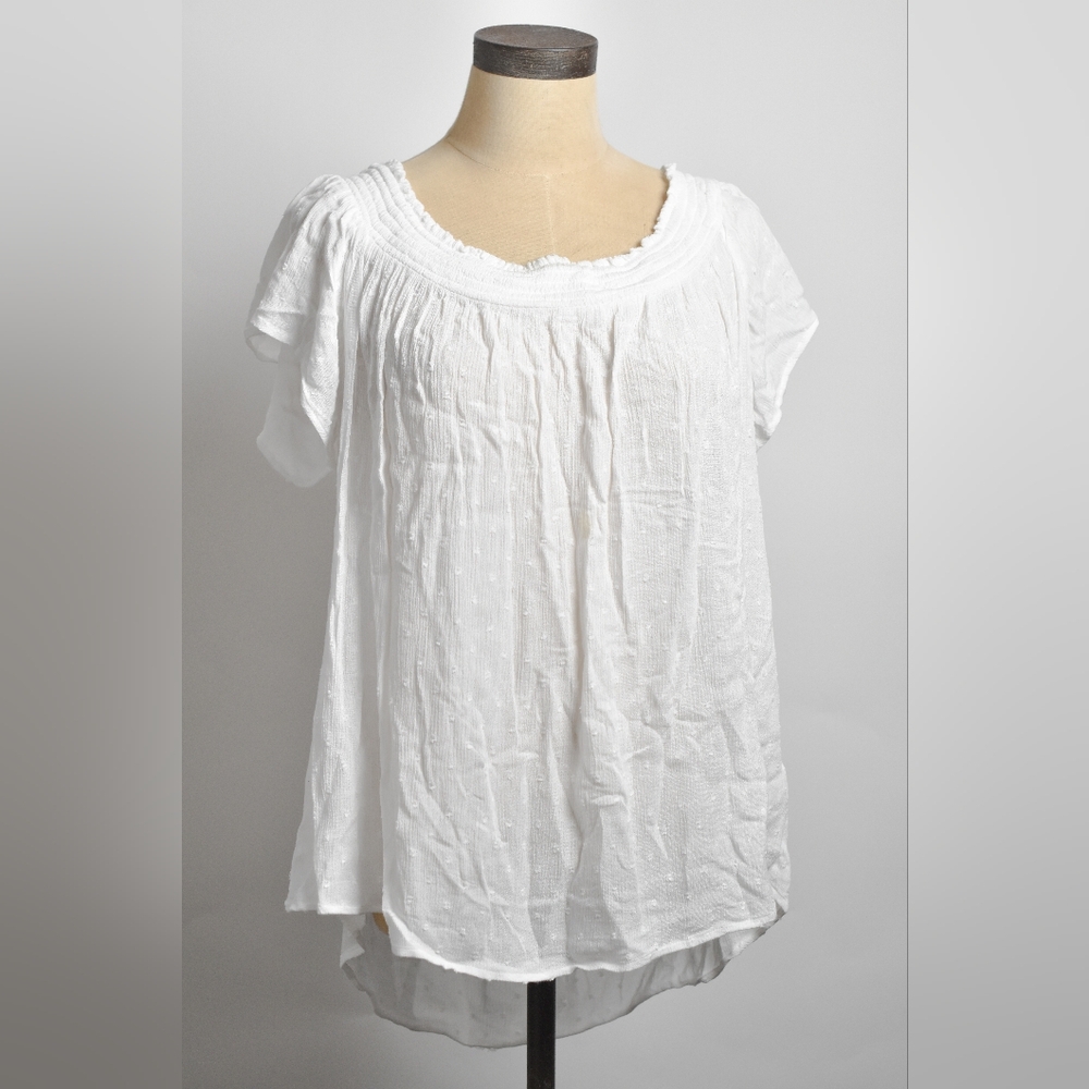 White summer casual top size L made with cotton gauze-like material.